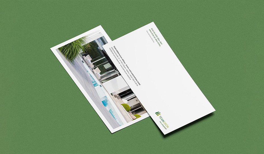 Ansicht Vorder- und Rückseite einer Postkarte von Team Grün auf grünem Untergrund