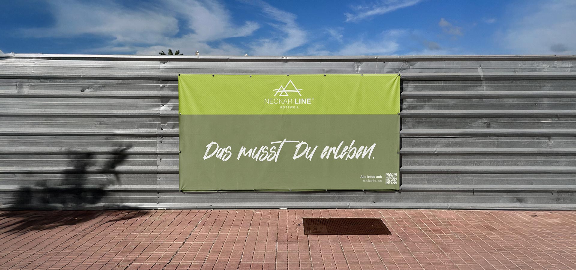Abbildung des Bauzaunbanners der NECKARLINE.